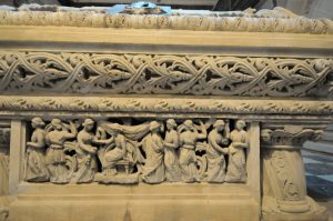 Detail of a sarcophagus at the Mărăști Mausoleum decorated with floral motifs and a bas-relief of female figures