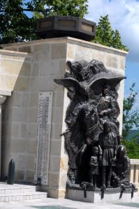 Bronze bas-relief and commemorative plaque on the facade of the Mărăști Mausoleum