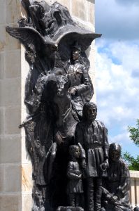 Detail of the bronze bas-relief at the Mărăști Mausoleum, showing an officer on horseback and civilians