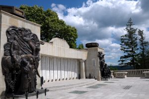 General view of the Mărăști Mausoleum facade, featuring bronze bas-reliefs and memorial plaques