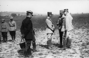 General Berthelot and military officers, including Văitoianu, talking on an open field