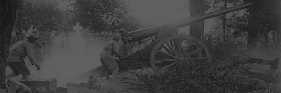 Soldiers operating a heavy artillery cannon on wooden wheels during battle