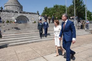 Princess Margareta and Prince Radu walking down the steps at the Mărășești Mausoleum