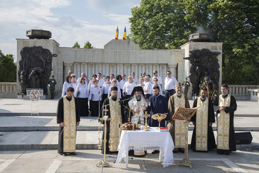 Religious service with priests and a choir in front of the Mărăști Mausoleum